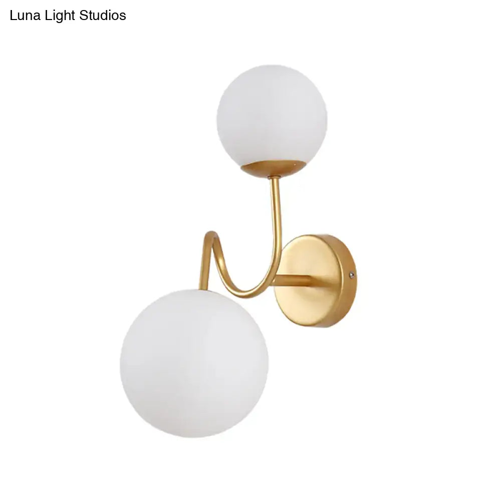 Gold brass wall sconce with dual adjustable frosted glass globes Decorbites on Tampa Home & Garden Store