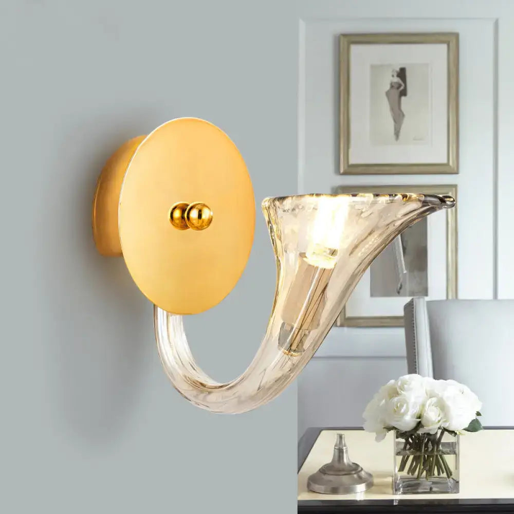 Decorbites gold glass horn wall lamp with round gold backplate and curved transparent shade on Tampa Home & Garden Store