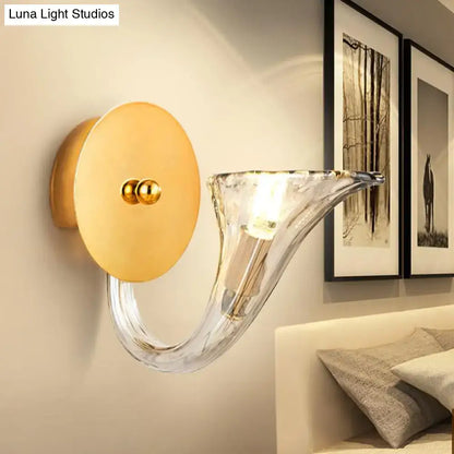 Decorbites Gold Glass Horn Wall Lamp with round brass backplate and clear curved horn on Tampa Home & Garden Store