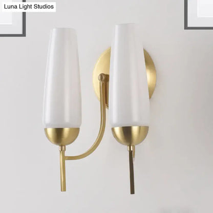 Gold Opal Conical Sconce by Decorbites, brass finish with a pair of white glass shades on Tampa Home & Garden Store