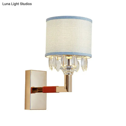 Gold crystal fabric shade sconce by Decorbites, wall mounted blue trim and crystal drops on Tampa Home & Garden Store