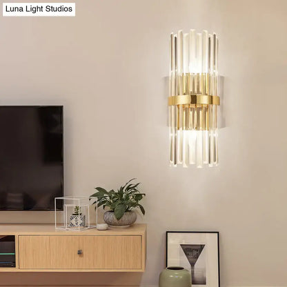Gold crystal cylinder lamp wall sconce with vertical glass prisms and a gold band on Tampa Home & Garden Store