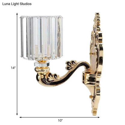 Gold crystal cylinder wall sconce by Decorbites, scroll arm and crystal shade, 14in tall on Tampa Home & Garden Store