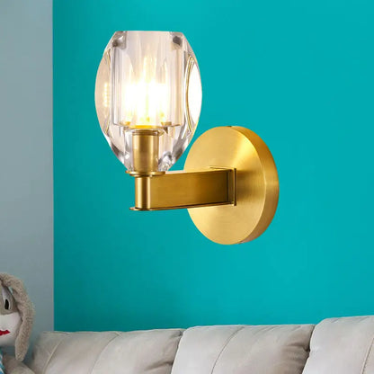 Gold Crystal Ball Wall Light brass wall sconce with clear crystal shade on teal by Decorbites on Tampa Home & Garden Store