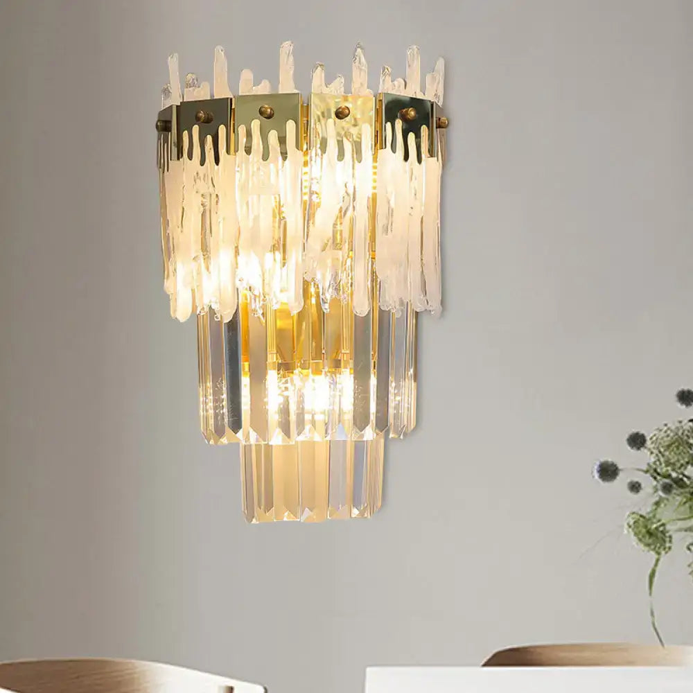 Gold crystal dining room wall sconce with cascading prism strands and a gold band on Tampa Home & Garden Store