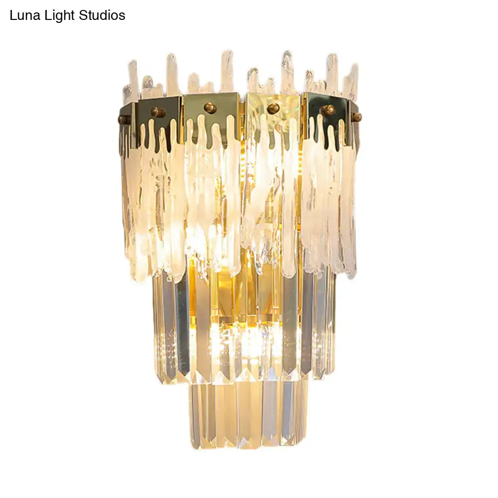 Gold Crystal Dining Room Wall Sconce by Decorbites with cascading glass prisms and warm light on Tampa Home & Garden Store