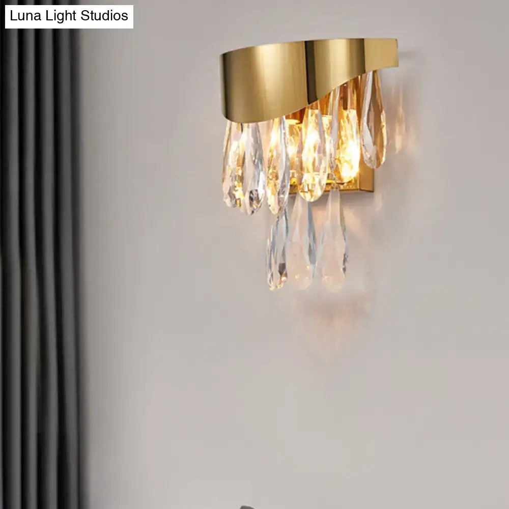 Gold crystal teardrop sconce with dangling prisms in gold finish by Decorbites on Tampa Home & Garden Store
