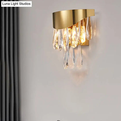 Gold crystal teardrop sconce with dangling prisms in gold finish by Decorbites on Tampa Home & Garden Store