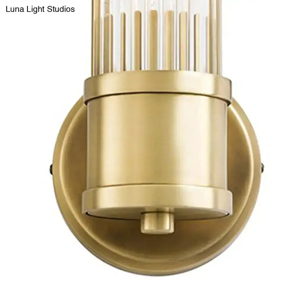 Decorbites gold crystal wall sconce with cylindrical body and round backplate for living room on Tampa Home & Garden Store