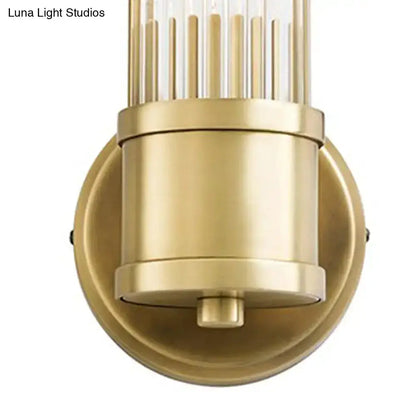 Decorbites gold crystal wall sconce with cylindrical body and round backplate for living room on Tampa Home & Garden Store