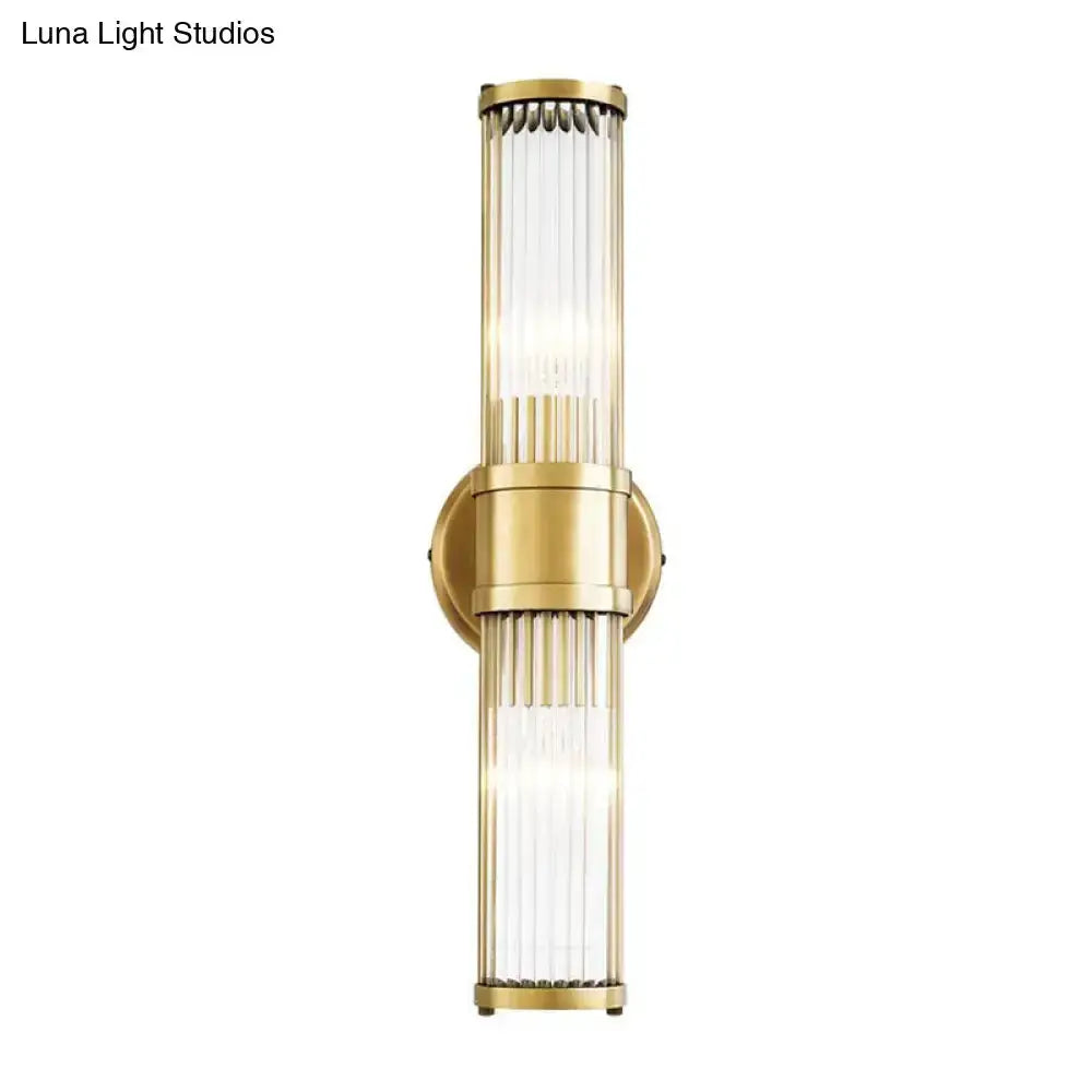 Gold crystal wall sconce by Decorbites with twin vertical ribbed crystal tubes on Tampa Home & Garden Store