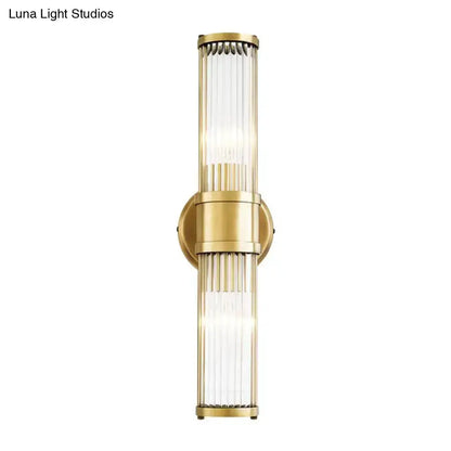 Gold crystal wall sconce by Decorbites with twin vertical ribbed crystal tubes on Tampa Home & Garden Store
