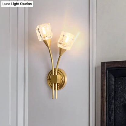 Gold cube crystal wall sconce by Decorbites with dual brass stems and glass shades on round backplate on Tampa Home & Garden Store