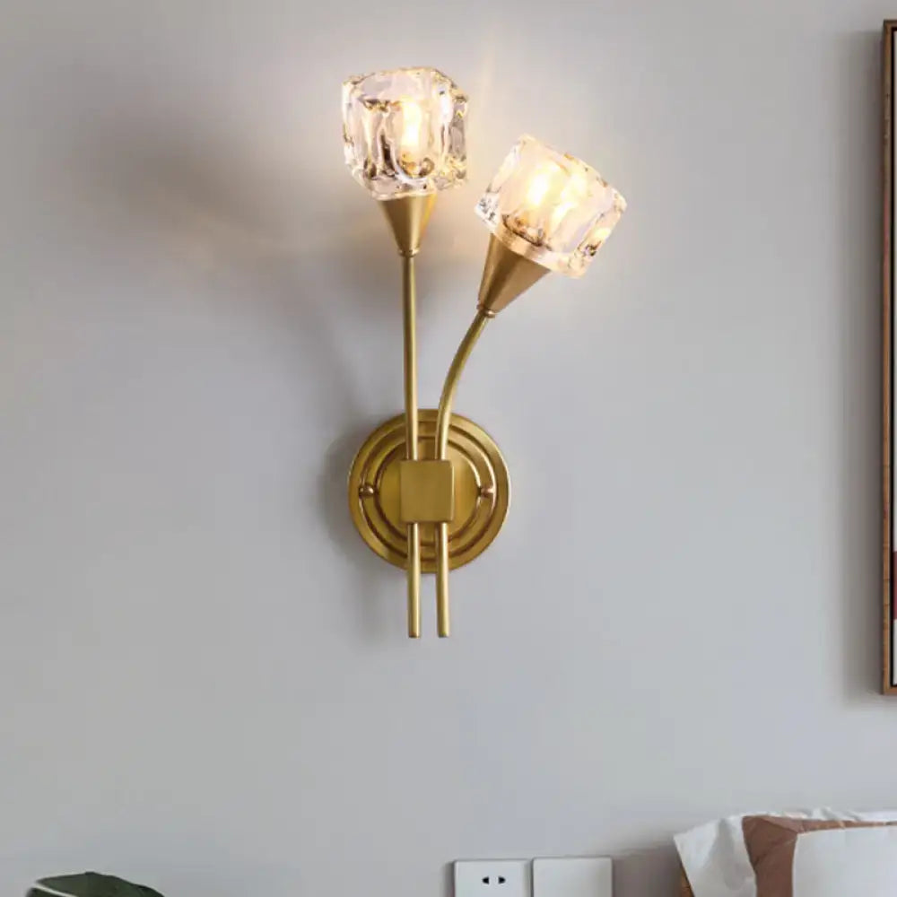 Gold Cube Crystal Sconce with dual brass arms and crystal cube shades on a round backplate on Tampa Home & Garden Store