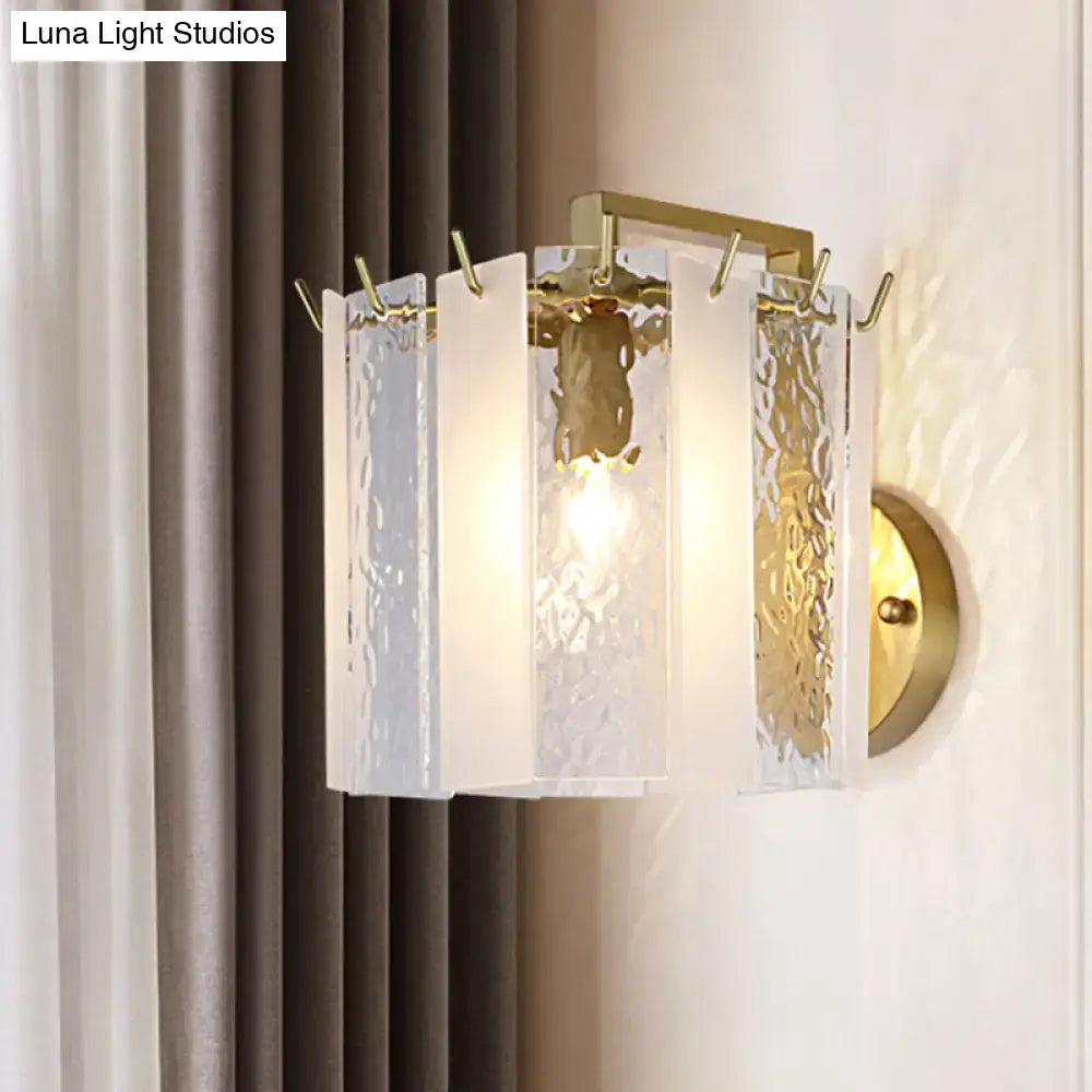 Gold drum glass sconce by Decorbites, wall-mounted with hammered glass panels on Tampa Home & Garden Store