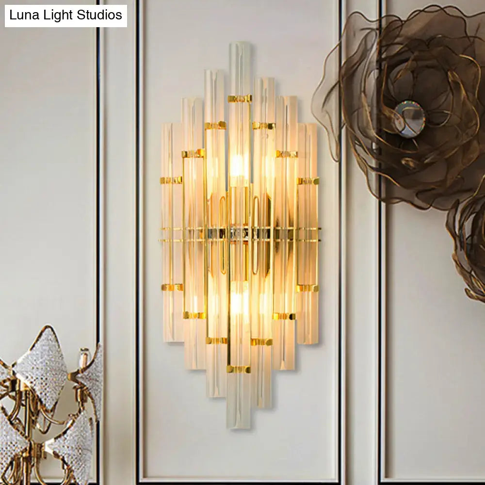 Gold crystal tube sconce, sunburst wall light with warm glow, direct-wired on Tampa Home & Garden Store
