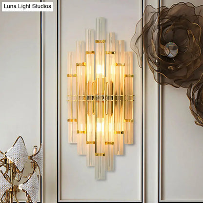 Gold crystal tube sconce, sunburst wall light with warm glow, direct-wired on Tampa Home & Garden Store