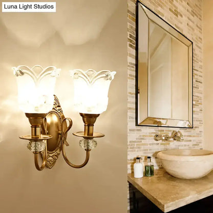 Contemporary gold frosted glass petal wall lamp two-light brass sconce by Decorbites on Tampa Home & Garden Store