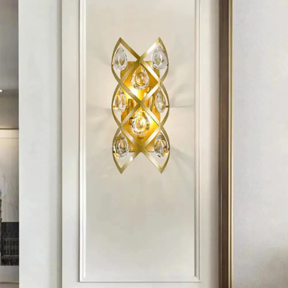 Contemporary gold geometric teardrop sconce by Decorbites with clear crystal accents on Tampa Home & Garden Store