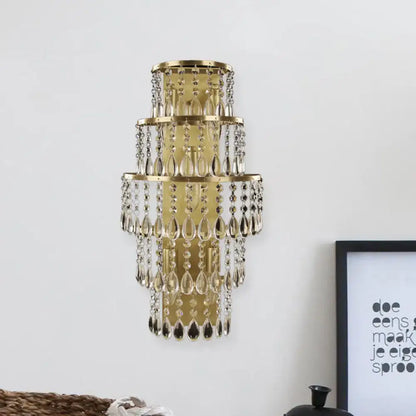 Gold Layered Crystal Lamp wall sconce with cascading teardrop crystals and a circular gold frame on Tampa Home & Garden Store