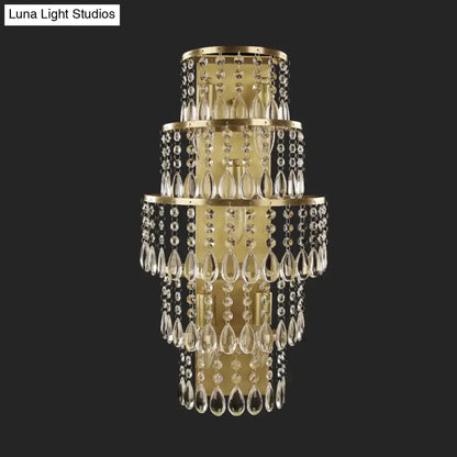 Gold layered crystal lamp chandelier with dangling teardrop prisms in gold finish on Tampa Home & Garden Store