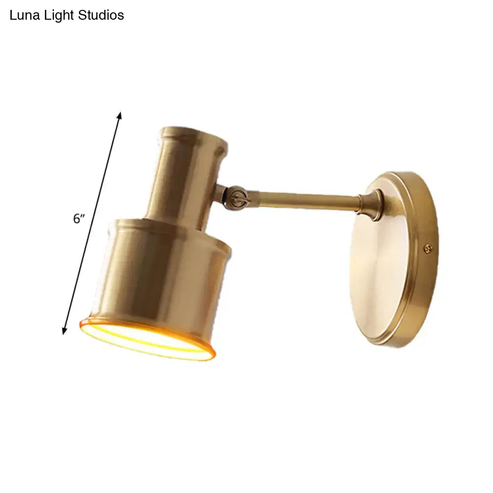 Gold cylinder wall sconce with adjustable brass arm and round mount, 6in height Decorbites on Tampa Home & Garden Store