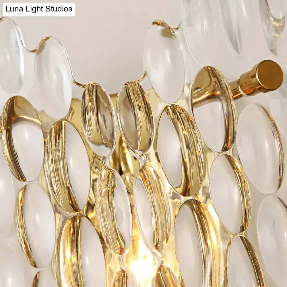 Contemporary gold metal wall light with clear crystal discs, Decorbites hallway fixture on Tampa Home & Garden Store