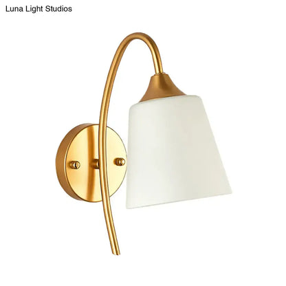 Decorbites Gold Milk Glass Tapered Bedroom Sconce with curved brass arm on Tampa Home & Garden Store