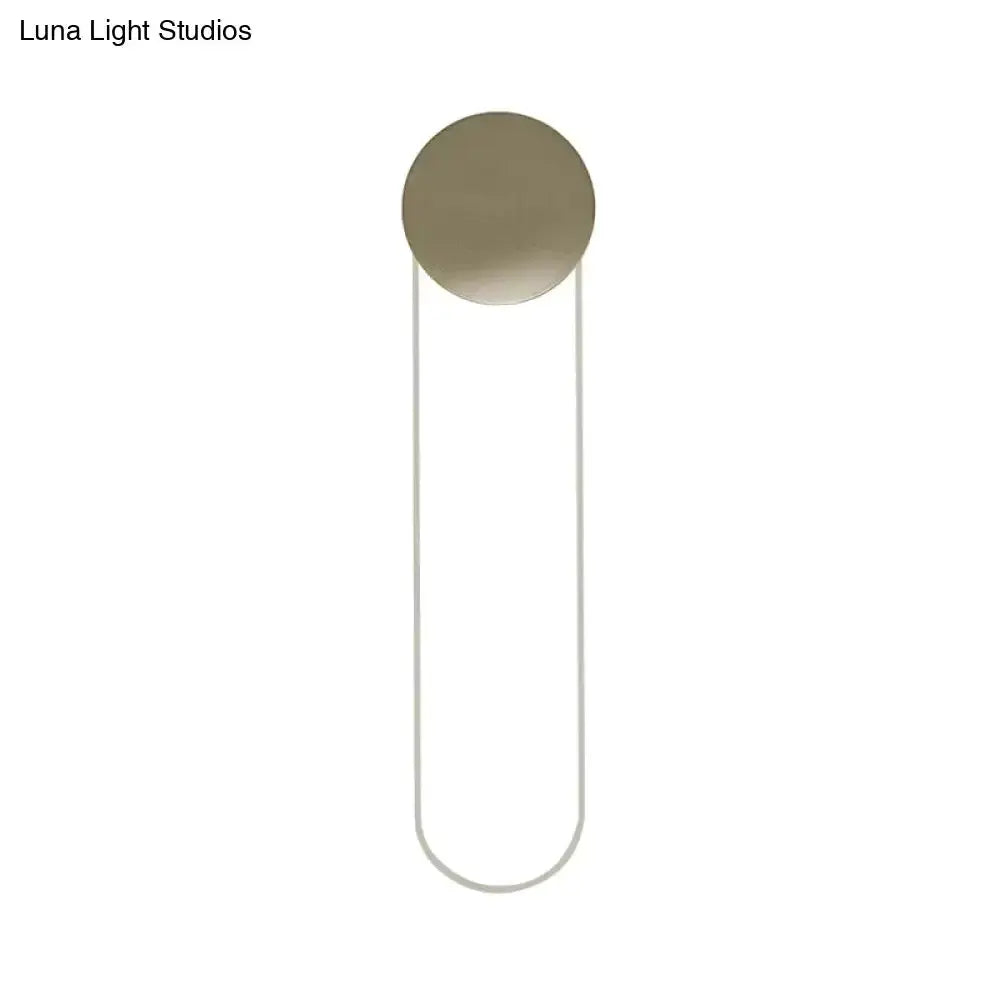 Decorbites gold oblong wall light with circular backplate and U-frame on Tampa Home & Garden Store