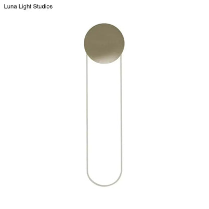 Decorbites gold oblong wall light with circular backplate and U-frame on Tampa Home & Garden Store
