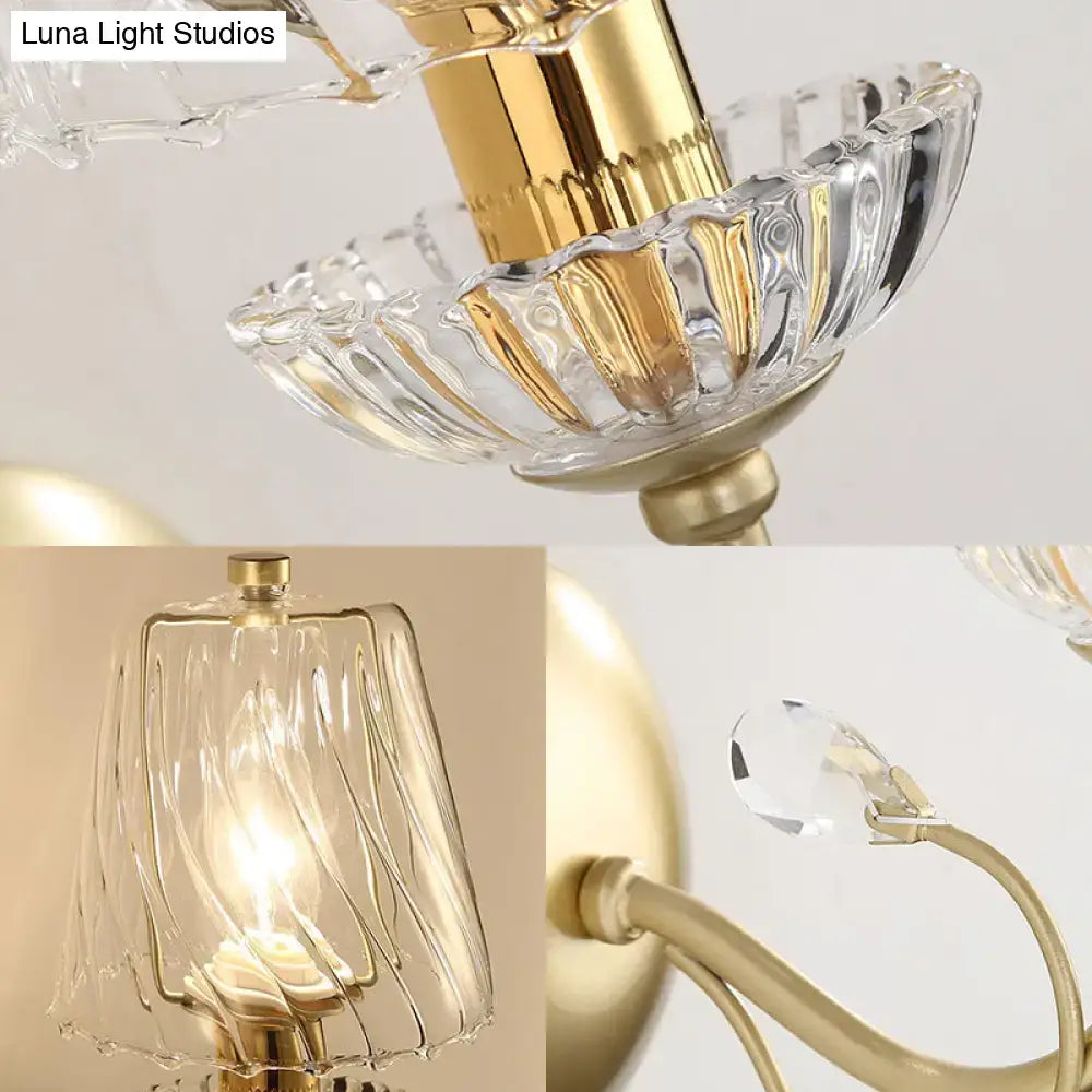 Gold swirl glass sconce by Decorbites with crystal shade for bedroom wall lighting on Tampa Home & Garden Store