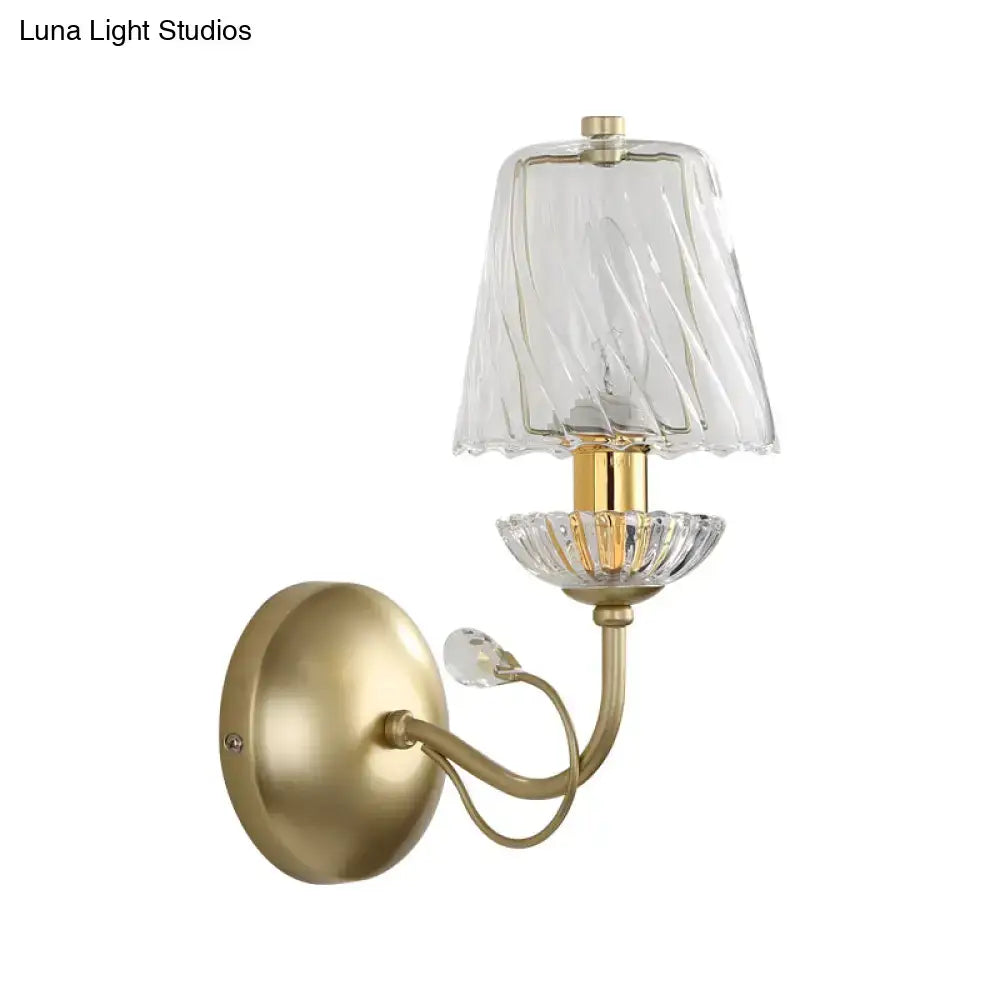 Gold Swirl Glass Sconce wall light with brass finish by Decorbites and clear swirled glass shade on Tampa Home & Garden Store