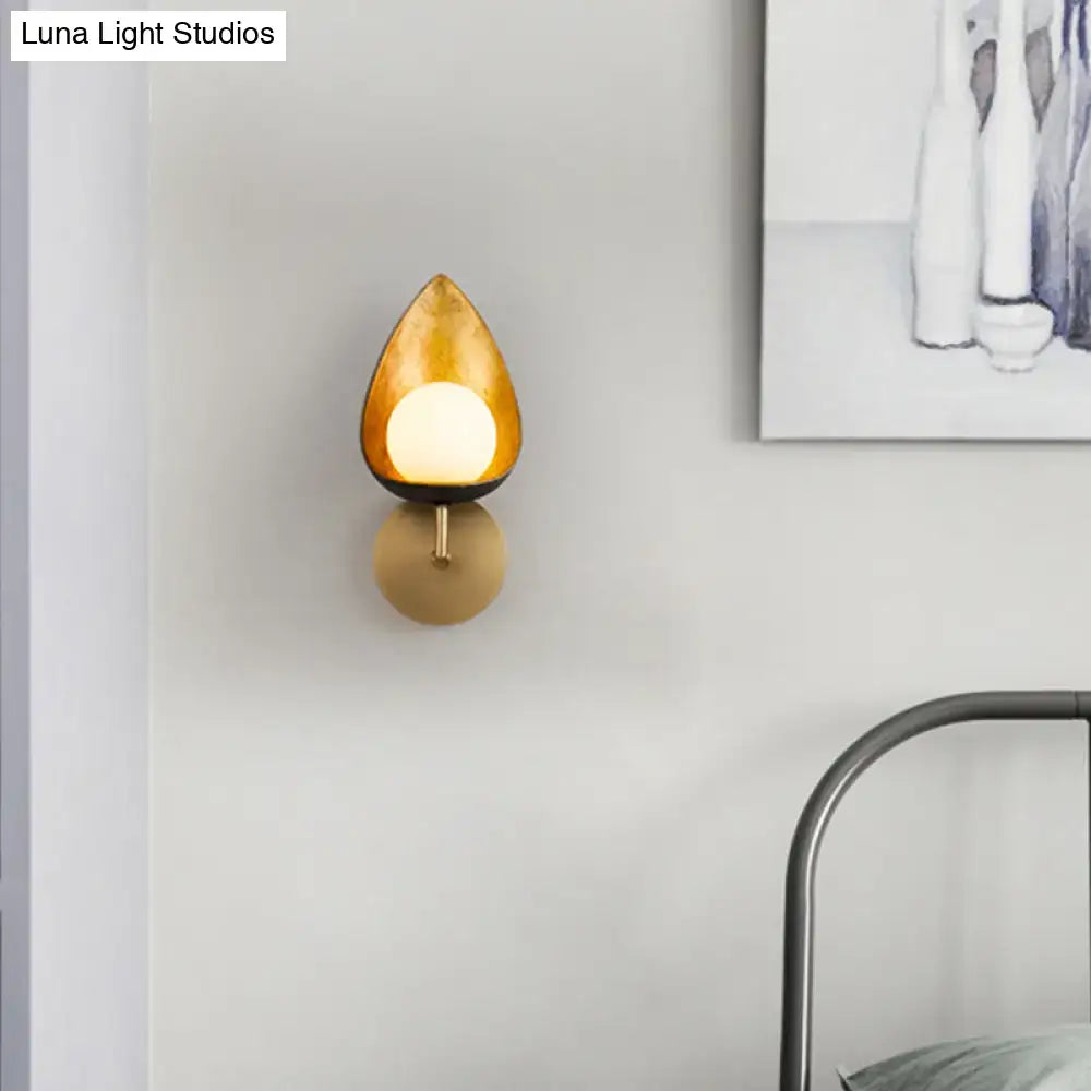 Decorbites gold teardrop glass sconce wall light with amber glass shade and brass mount on Tampa Home & Garden Store