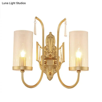 Gold Clear Glass Sconce 1-2 Light Design with dual arms, ornate backplate, cylindrical shades on Tampa Home & Garden Store
