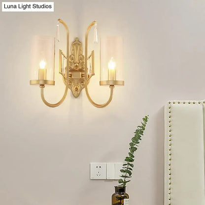 Gold clear glass sconce by Decorbites, 1-2 light dual-arm design with backplate on Tampa Home & Garden Store