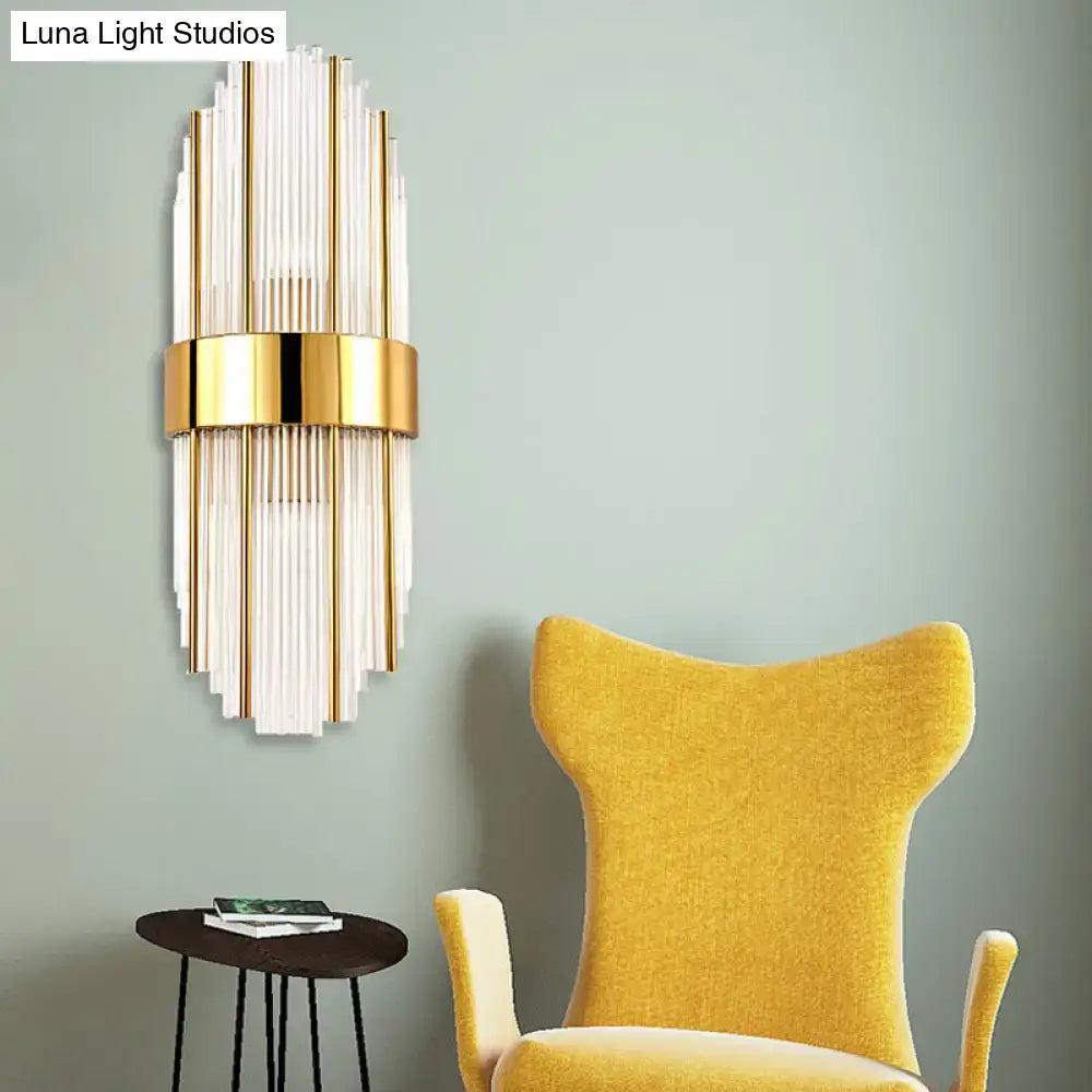 Brass crystal oval shade wall light by Decorbites with vertical glass rods on Tampa Home & Garden Store