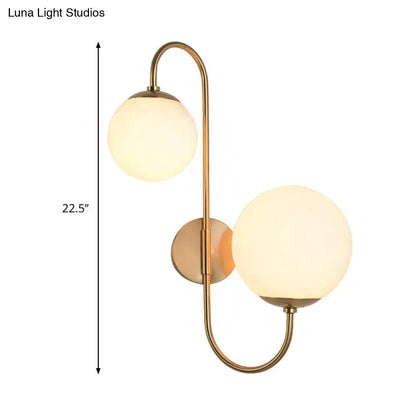 Gold opal glass ball shade dual-arm brass sconce Decorbites 2 globe shades tall on Tampa Home & Garden Store