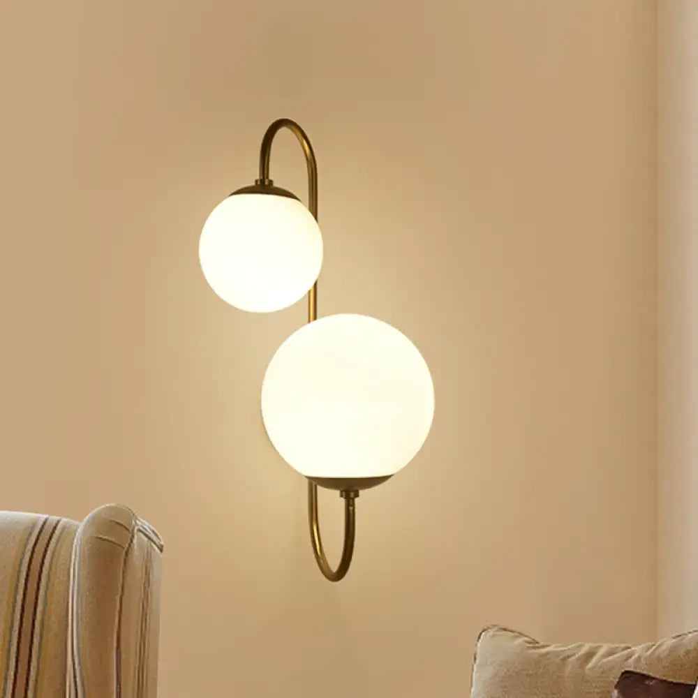 Decorbites gold opal glass ball shades dual-arm sconce brass finish on Tampa Home & Garden Store