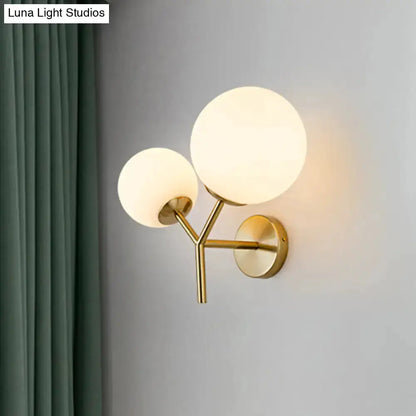 Contemporary gold and white spherical glass wall sconce, dual globes by Decorbites on Tampa Home & Garden Store