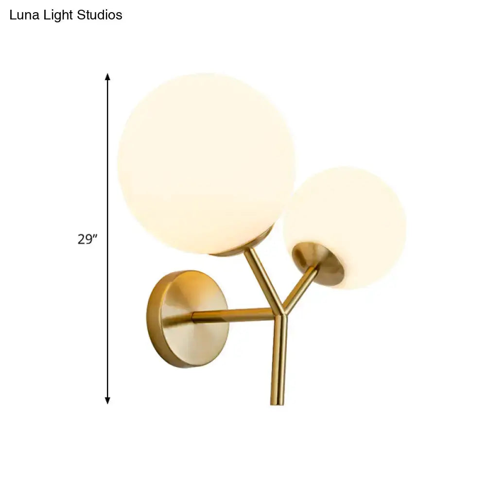Wall sconce with contemporary gold brass and white glass globes, dual spheres Decorbites on Tampa Home & Garden Store