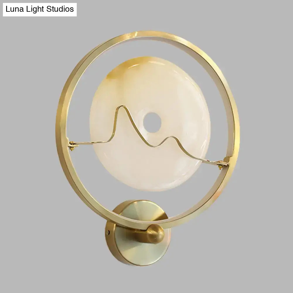 Jade Gold Wall Sconce by Decorbites, circular brass ring with frosted glass disc on Tampa Home & Garden Store