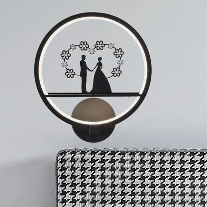Black circular LED sconce with ring light and couple silhouette, Decorbites on Tampa Home & Garden Store