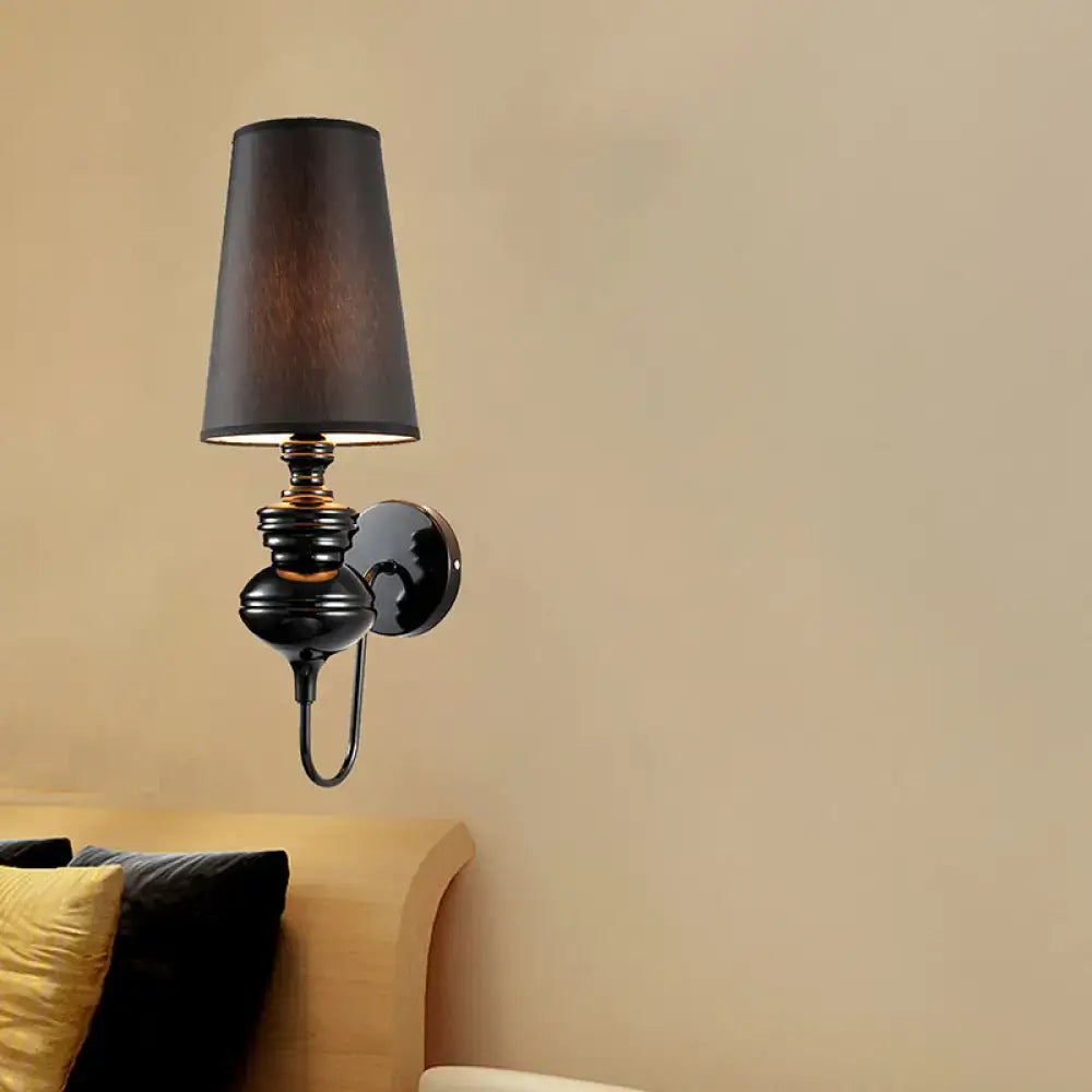 Matte black fabric sconce by Decorbites with black metal wall mount on Tampa Home & Garden Store