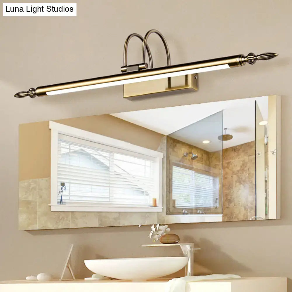 Contemporary nickel finish LED wall sconce with a long bar above a vanity mirror on Tampa Home & Garden Store