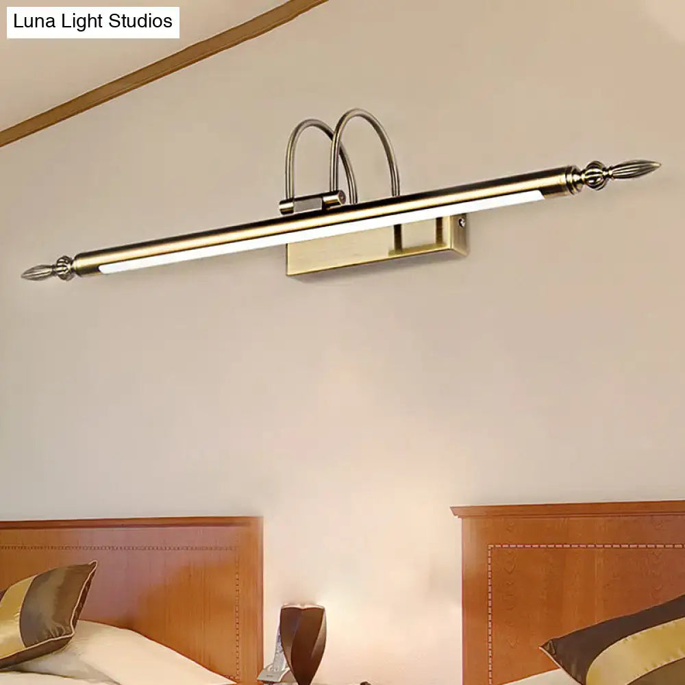 Contemporary nickel LED wall sconce with warm light, above bed, Decorbites on Tampa Home & Garden Store