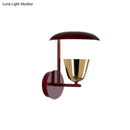 Contemporary red and gold wall sconce by Decorbites with red backplate and gold cup shade on Tampa Home & Garden Store