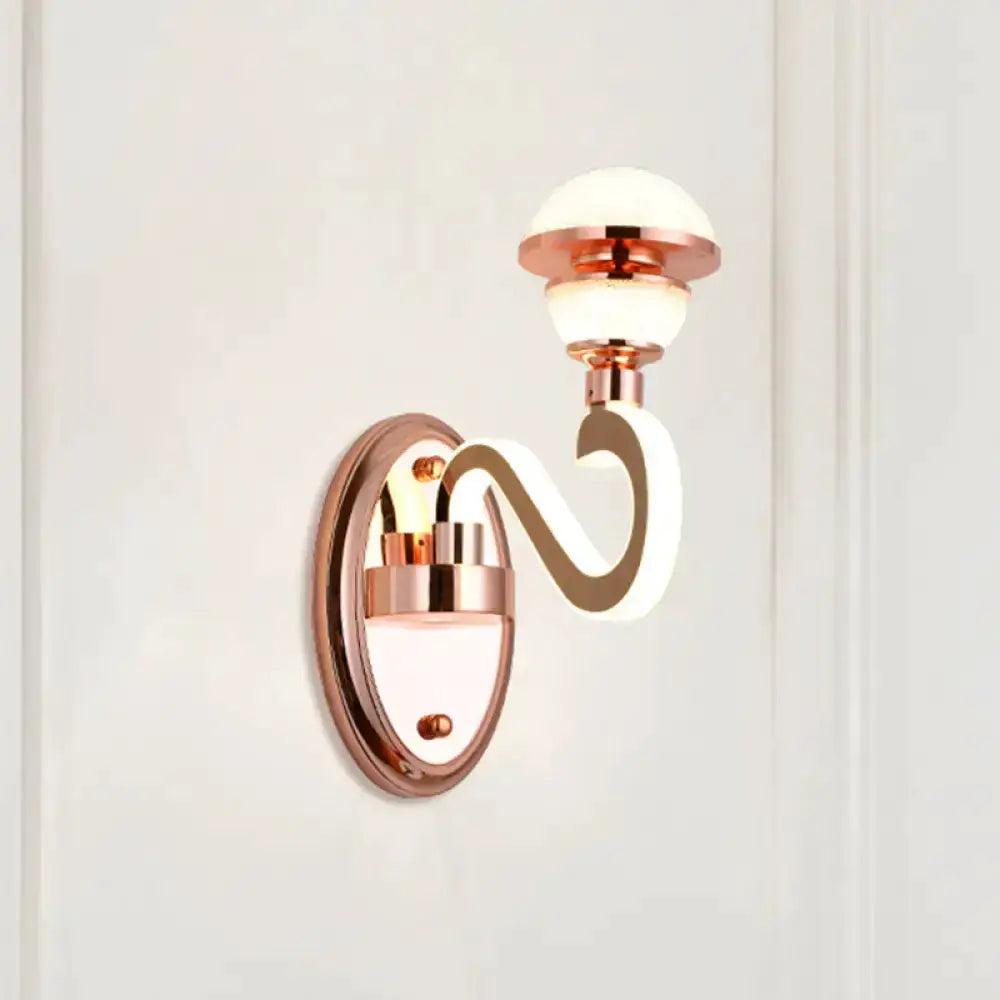 Contemporary rose gold metal urn wall lamp with curved arm and frosted shade by Decorbites on Tampa Home & Garden Store