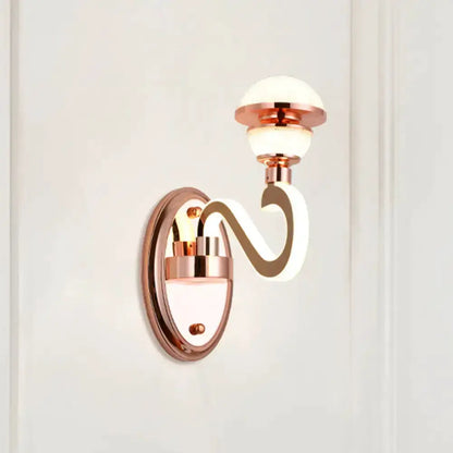 Contemporary rose gold metal urn wall lamp with curved arm and frosted shade by Decorbites on Tampa Home & Garden Store