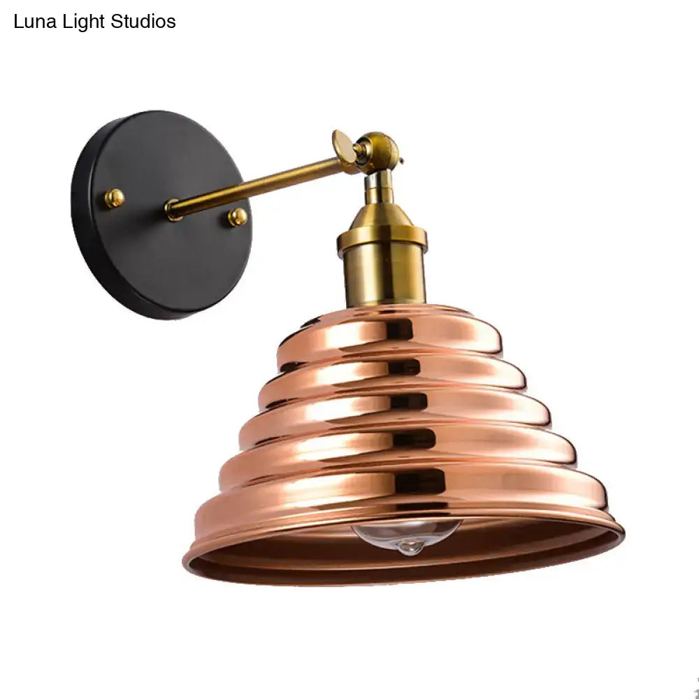 Rose Gold Ribbed Metal Sconce with Brass Arm and Black Backplate on Tampa Home & Garden Store