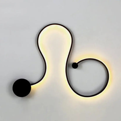 Black White Twist Sconce by Decorbites with curved white body and black accents on wall on Tampa Home & Garden Store